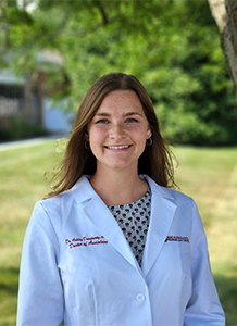 woman in white coat